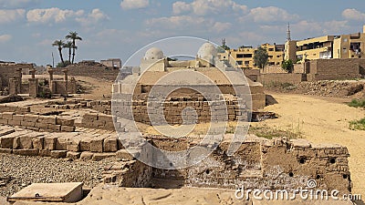 Ruins on the South side of the Avenue of Sphinxes leading to the first pylon of the Karnak Temple in Luxor, Egypt. Stock Photo