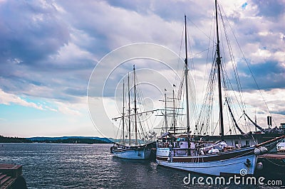 Picture of sailboats reflected in water, yacht port on the bay, water transport Stock Photo