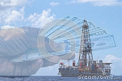 Picture showing oil offshore installation and US dollars in a background. Stock Photo