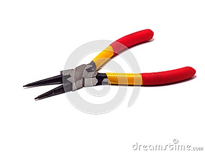 Picture of snap ring plier that has a yellow - red handle Stock Photo