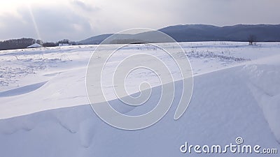 Snow dines on sunny day Stock Photo