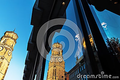 The Stiftskirche in Stuttgart, Germany, reflecting in a shop window Stock Photo