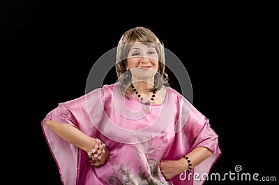 Picture of stunning older woman posing with amethyst rose quartz jewelry Stock Photo