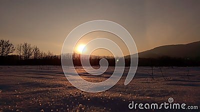 Sunset on snow land Stock Photo