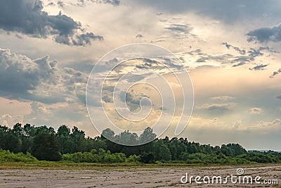 Dramatic cloudscape over abandoned airport runway Stock Photo