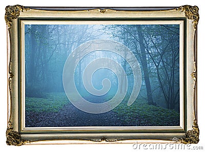Picture in vintage frame. Mystical autumn forest with trail in blue fog. Beautiful landscape with trees, path, fog. Nature backgro Stock Photo