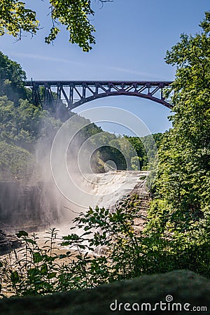 Picture of waterfalls and a railroad bridge above the waterfalls Stock Photo