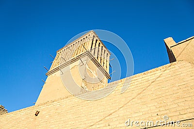 Typical Windtower made of clay taken in the streets of Yazd, iran. These towers, aimed at cooling down buildings in the desert Stock Photo