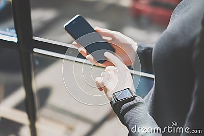 Picture Woman Working Modern Studio,Wearing Generic Design Smart Watch Hand.Female Finger Touching Screen Mobile Phone Stock Photo