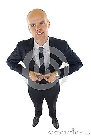 Picture of a young businessman buttoning his coat Stock Photo