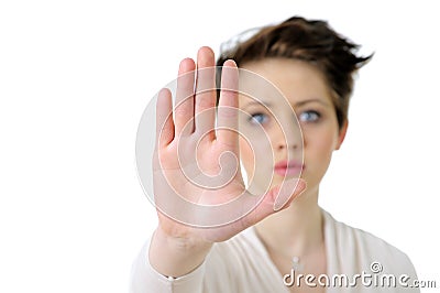 Picture of young woman making stop gesture Stock Photo