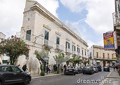 Baroque architecture along a street in the City of Ostuni, Apulia, Italy. Editorial Stock Photo