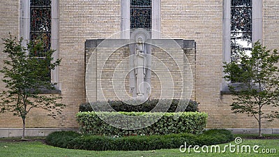 `Mother of the World` statue on the south side of Christ the King Catholic Church in Dallas, Texas. Editorial Stock Photo