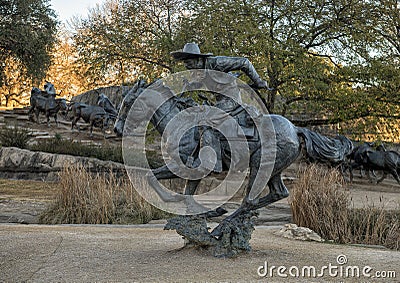 Bronze cowboy on horseback in the Pioneer Plaza, Dallas, Texas. Editorial Stock Photo