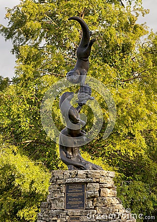 Bronze sculpture titled Arkansas River Otters by Robert Ball in Tulsa, Oklahoma. Editorial Stock Photo