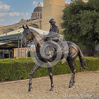 Bronze statue of Alysheba by renowned equine artist Lisa Perry at Lone Star Park in Grand Prairie, Texas. Editorial Stock Photo