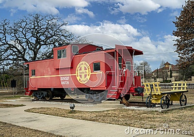 BNSF Caboose 999729 on display in Bransford Park in the City of Colleyville, Texas. Editorial Stock Photo