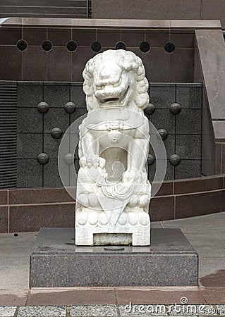 White marble male guardian lion at entrance to the Crow Museum of Asian Art in downtown Dallas, Texas Editorial Stock Photo