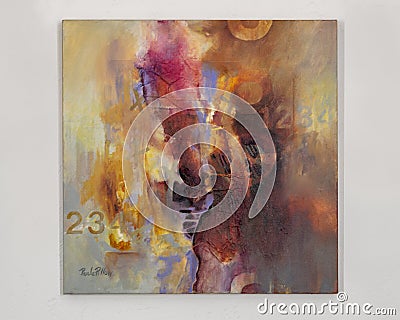Colorful, square abstract painting by artist Paula Pillow mounted on the wall of my home in Dallas, Texas. Stock Photo
