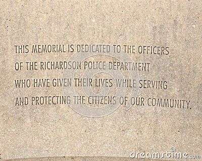 Dedication for the police memorial `Radiant Shield` by Shane Allbirtton and Norman Lee at the police station in Richardson, Texas. Editorial Stock Photo