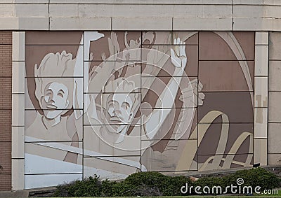 Distinctive wall mural featuring a roller coaster along Interstate 30 in Arlington, Texas. Editorial Stock Photo