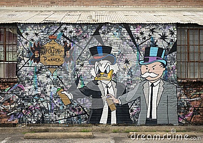 Duck and man mural by The House of Pannek in Deep Ellum, Texas. Editorial Stock Photo