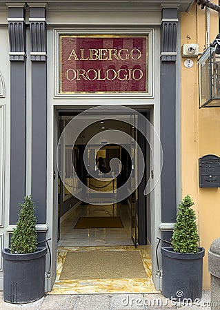 Entrance to the Art Hotel Albergo Orologio at the center of Bologna, Italy. Editorial Stock Photo