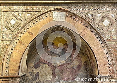 Fresco over a tombstone at one end of the Pilate courtyard in the Basilica of Saint Stephen in Bologna, Italy. Stock Photo