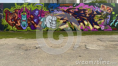 Graffiti style mural with surrealistic characters for 2023 Trigger Fingers event in Deep Ellum, Texas. Editorial Stock Photo