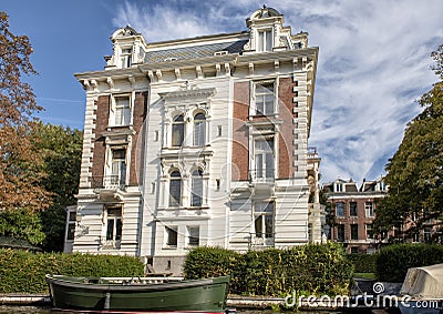 Historic rich merchant home along canal in Amsterdam, Netherlands Stock Photo