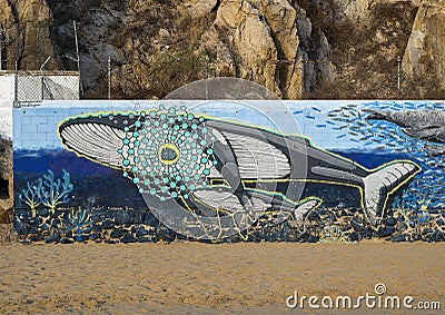 Humpback whale part of a mural titled Sea Giants on the wall of an old tuna factory on Cosario Beach in Cabo San Lucas. Editorial Stock Photo
