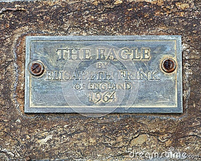 Information plaque for bronze memorial to President Kennedy titled `The Eagle` by Elisabeth Frink outside the World Trade Center. Editorial Stock Photo