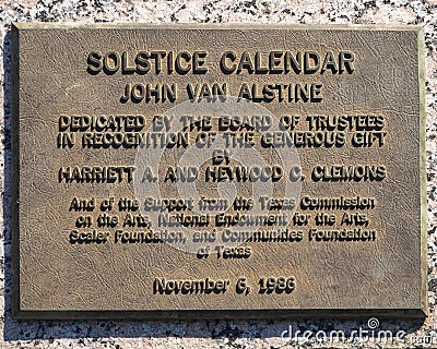 Information plaque for `Solstice Calendar` by John Van Alstine on the campus of Austin College in Sherman, Texas. Editorial Stock Photo