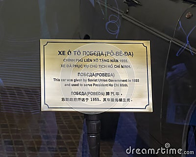 Information plaque for armored 1955 GAZ-M20 Pobeda car donated by Russia for use by President Ho Chi Minh in 1955 Editorial Stock Photo