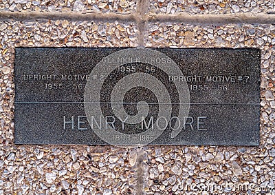 Information plaque, three standing bronze sculptures by sculptor Henry Moore outside the Amon Carter Museum in Fort Worth, Texas. Editorial Stock Photo