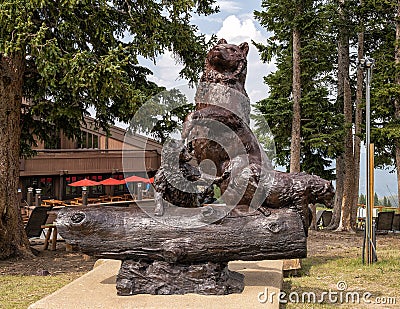 Large bronze sculpture of a bear and her cubs at Spruce Saddle Lodge in Beaver Creek, Colorado. Editorial Stock Photo