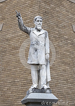 Marble statue of James A. Throckmorton by Pompeo Coppini outside the historic old Collin County Courthouse in McKinney, Texas. Editorial Stock Photo