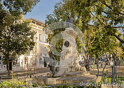 Monument to Eduardo Coelho, founder of the popular newspaer Diario de Noticias in 1864, located in Lisbon, Portugal. Stock Photo