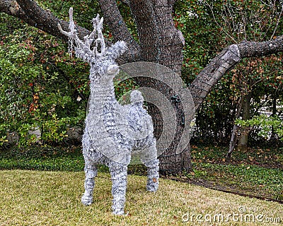 One of three silver reindeer figures in a Christmas display in Dallas, Texas Stock Photo