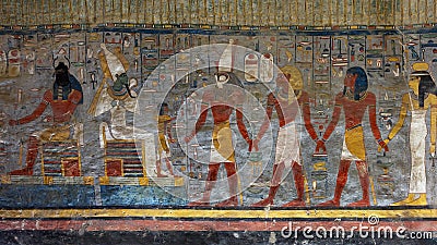 Painting of Osiris, a priest, Horus, Rameses I, Atum and Neith in Rameses I tomb number 16 in the Valley of the Kings in Luxor. Editorial Stock Photo