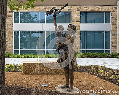 `Quiet Moment` by James Haire in 2020, part of the public art collection of the City of Frisco, Texas. Editorial Stock Photo