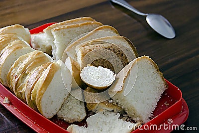 Sliced white bread on the old table. Stock Photo