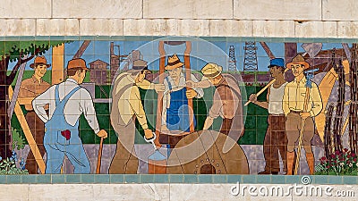 Portion of a long ceramic tile mural by Kenneth Gale at the top of the Amon Carter Auditorium in Fort Worth, Texas. Editorial Stock Photo