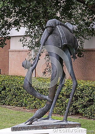 Whimsical bronze sculpture titled `Endangered Species` by David Cargill, located outside the World Trade Center in Dallas, Texas. Editorial Stock Photo