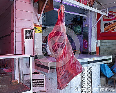 Side of beef for sale in the Medina Souk in Meknes, Morocco. Stock Photo