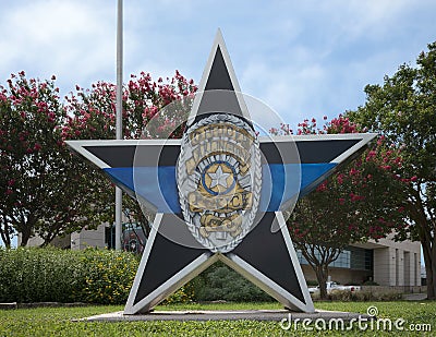 Six foot fiberglass star sculpture titled `An Ultimate Sacrifice`, by artist Justine Simmons in Arlington, Texas Editorial Stock Photo