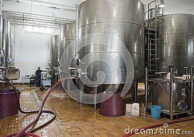 Stainless steel wine fermentation tanks, Tomaresca Tenuta Bocca di Lupo Editorial Stock Photo