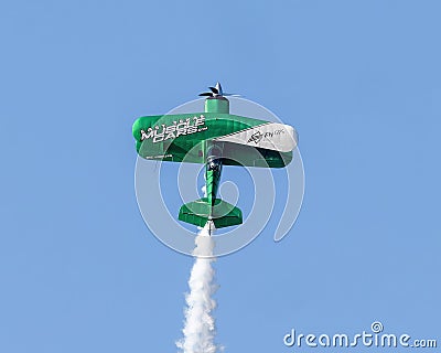 Stephen Covington piloting the Raptor, his Pitts S2S acrobatic biplane in the airshow July 4th at Grand Lake, Oklahoma. Editorial Stock Photo