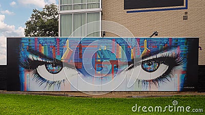 Striking eye mural by Dallas based artist and photographer Angela Antonson outside the Lorenzo Hotel. Editorial Stock Photo