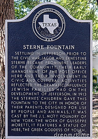 Texas Historical Commission marker for the Sterne Fountain featuring a statue of Hebe in Jefferson, Texas. Editorial Stock Photo